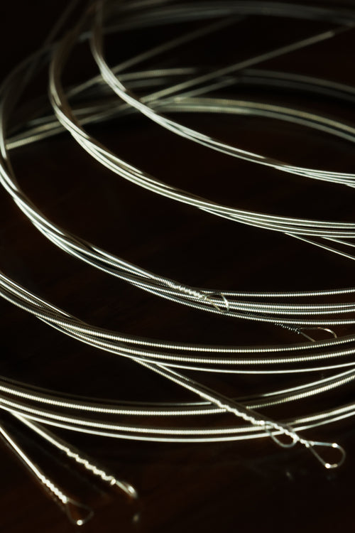 Stainless steel performance strings